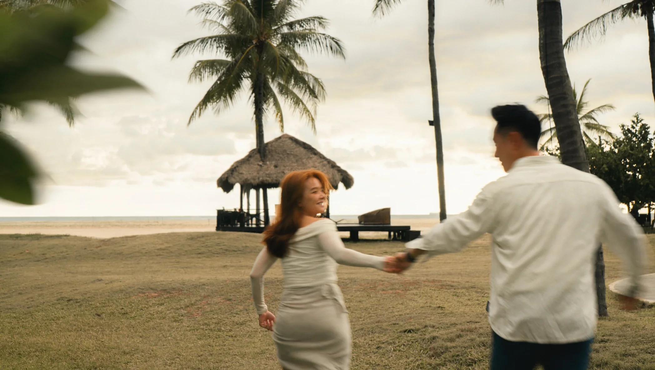 Ian and Phy running together by the beach at Rasa Ria